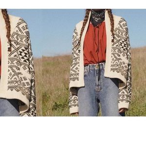 The Great. Black and Cream Shawl Collar Fair Isle Sweater